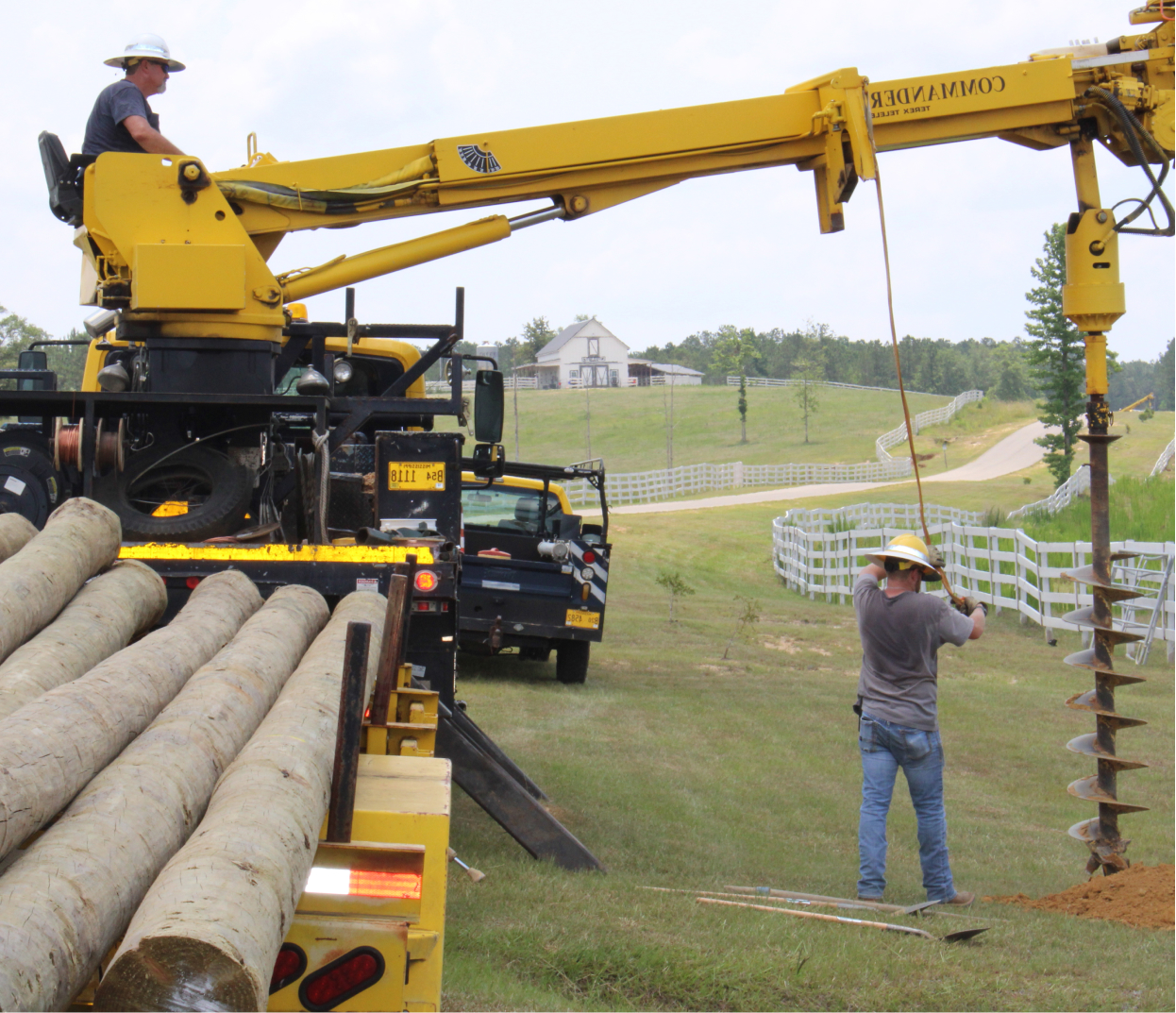 Heavy Machinery crew installing power lines 