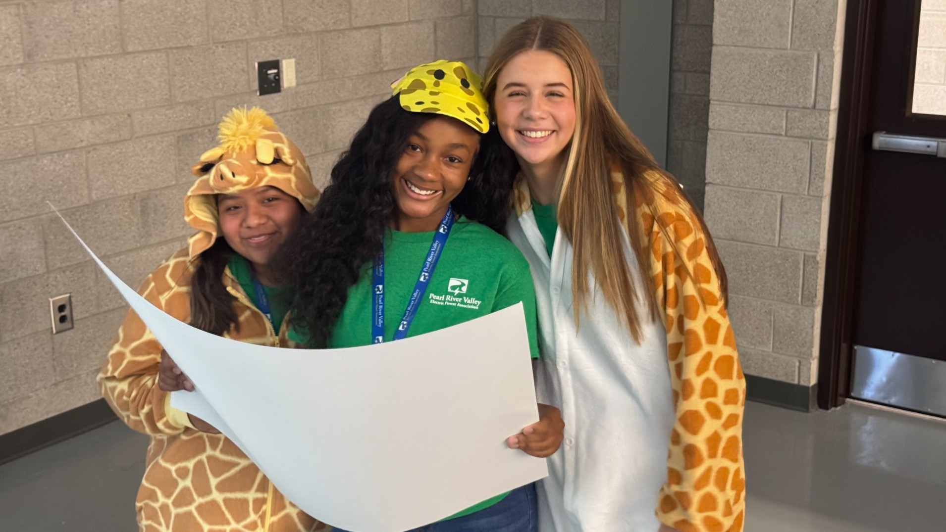 grade school children dressed up in giraffe costumes for a program held by Pearl River Valley